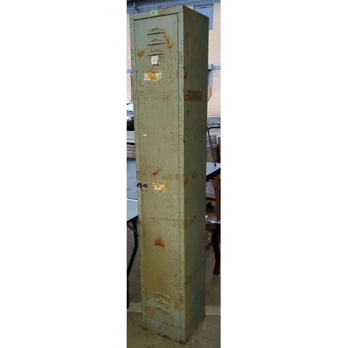 941 - A vintage grey metal upright storage locker, H183 x
W30 cm