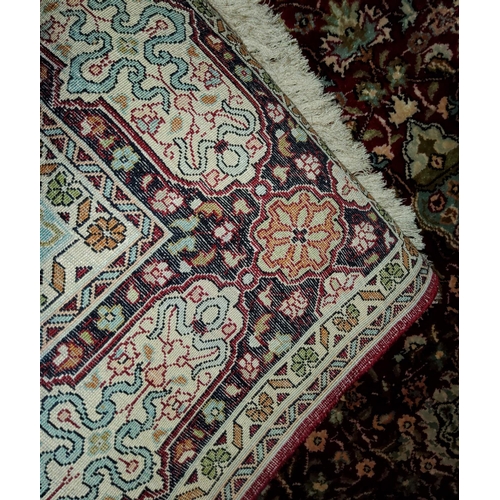 937 - A modern red ground, hand knotted Persian rug, length 184 cm.