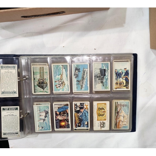 395 - An album of 19 sheets of rarer cigarette cards
