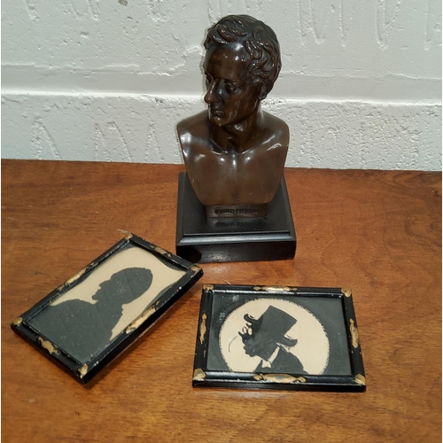 192a - A Bronze bust of Lord Byron on square slate plinth 
H15cm; a pair of framed siluette miniatures