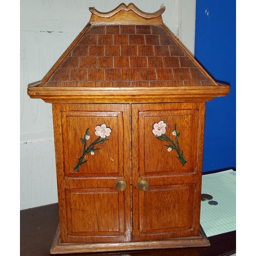 198a - A Chinese bamboo effect stained wood Majong set in case in the form of a house with panelled doors, ... 