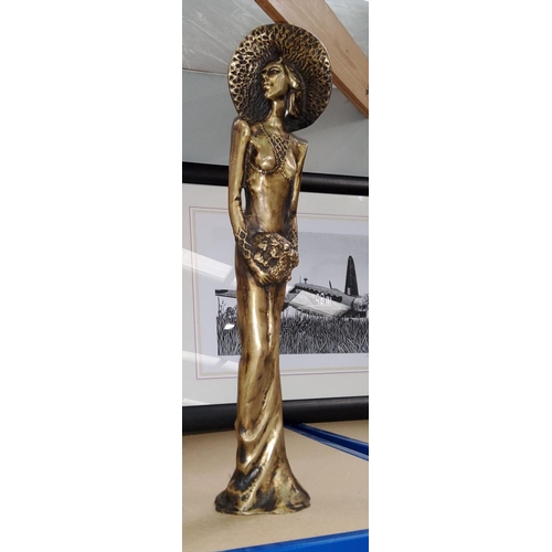 48 - A tall bronze of a lady in floor length dress and large 
hat signature to base (unreadable) height 4... 