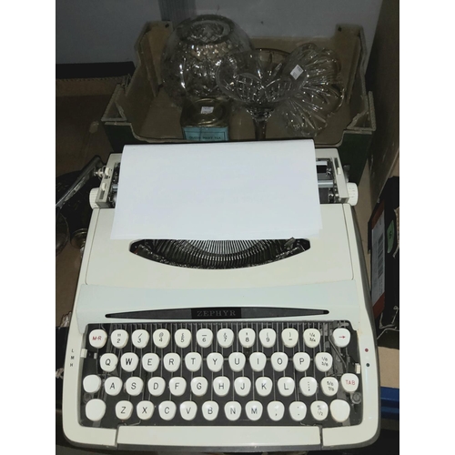 50A - A Zephyr vintage portable typewriter, a cut glass globular vase, a cocktail style vase, a vintage te... 