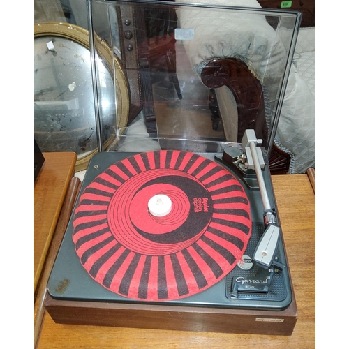 68 - A vintage Garrard record player SP25
