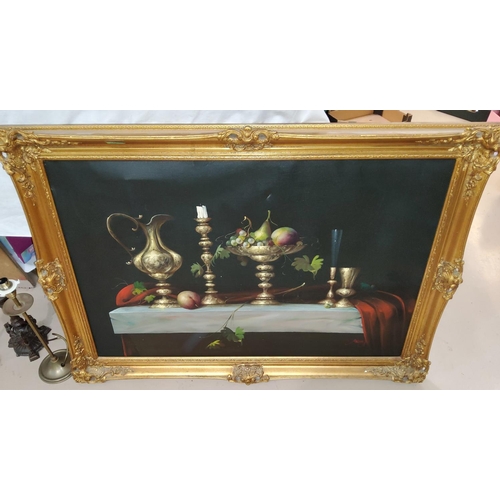 745 - A large oil on canvas of a table laid with brass jug, candlestick etc with fruit in a bowl on a marb... 