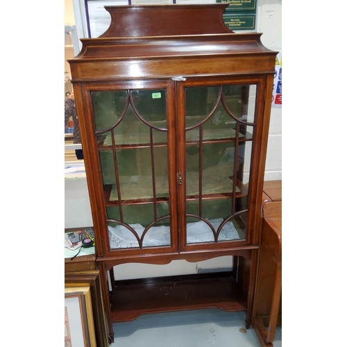 793 - An Edwardian Sheraton style side/display cabinet in inlaid crossbanded mahogany with 2 doors , caddy... 