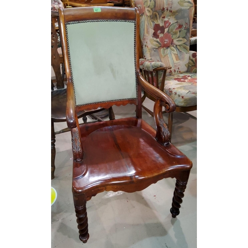 807 - A 19th century Scandinavian mahogany armchair with scroll arm rests, on barley twist legs