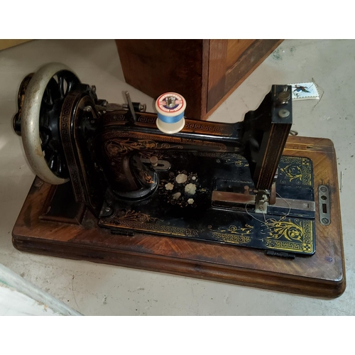 88 - A vintage hand operated sewing machine