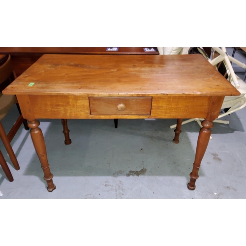 911 - A Victorian style stripped pine desk with single drawer on turned legs