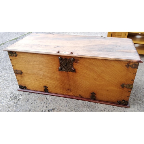920 - A large antique style solid top wooden chest with later  metalwork with interior candle box
