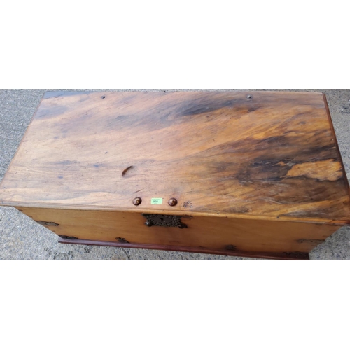 920 - A large antique style solid top wooden chest with later  metalwork with interior candle box
