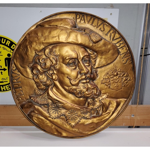 193a - A Peter Paul Rubens gilt coloured wall hanging plaque, made from compressed board
