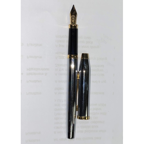 130 - A Cross fountain pen and ball point both with gilt highlights, the fountain pen having unmarked gilt... 