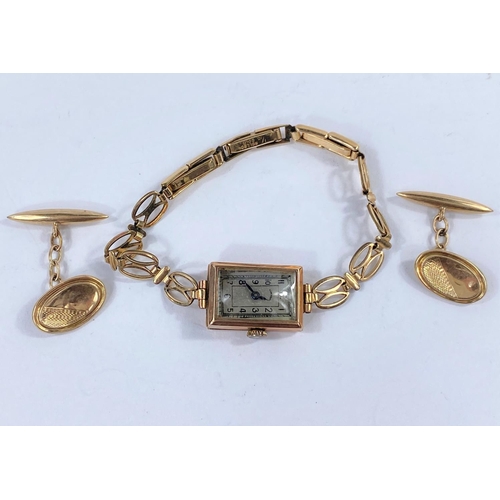 596B - A lady's 'Dominant' 9 carat hallmarked gold wristwatch on gold plated strap; a pair of cufflinks sta... 