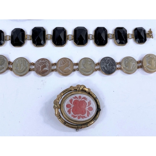 597B - An Italian lava carved cameo bracelet; a jet bracelet; an enamel and seed pearl mounted bracelet etc