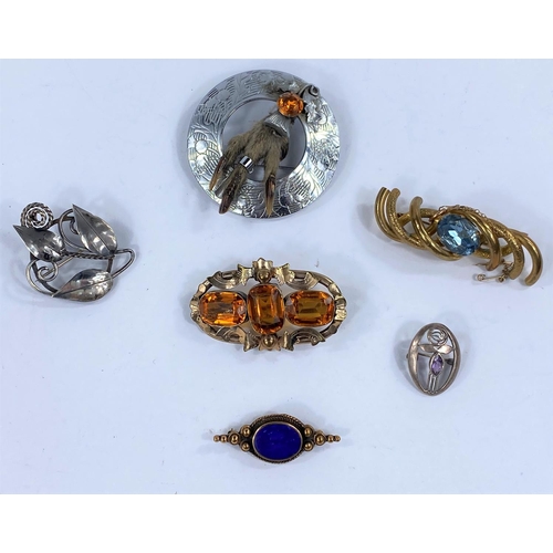 604 - Two art Nouveau style white metal brooches and 3 others