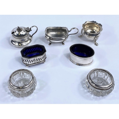642 - Four hallmarked silver salts and a mustard, various dates and assay offices, hallmarked silver 4.25 ... 