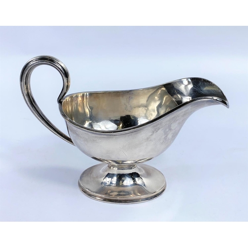 651A - A silver plated cruet in the form of a donkey with saddle bags and a large silver plated gravy boat