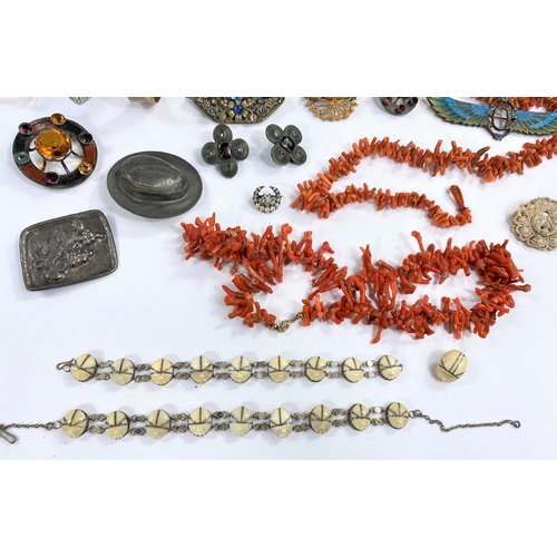 656 - A Victorian leather jewellery box containing coral necklaces; a Cairngorm brooch; a pearl necklace; ... 