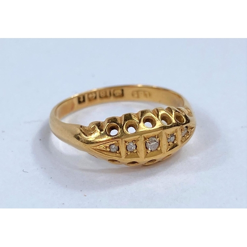 657 - An Edwardian 18 carat hallmarked gold ring with 5 small diamonds in split shank setting, 2.9 gm