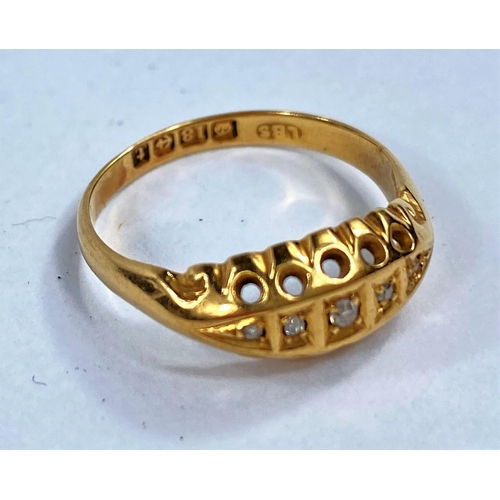 657 - An Edwardian 18 carat hallmarked gold ring with 5 small diamonds in split shank setting, 2.9 gm