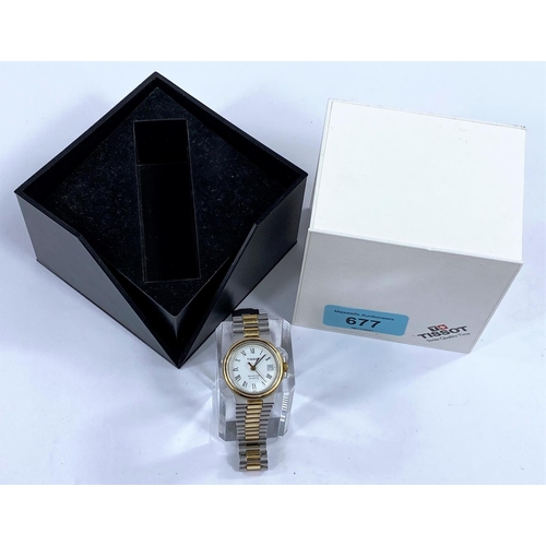 677 - A ladies Tissot digital watch with two-tone case and strap, original box