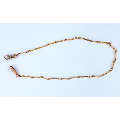 695 - A yellow metal watch chain formed from elongated and triple links, the clip stamped '9', 36.5cm long... 