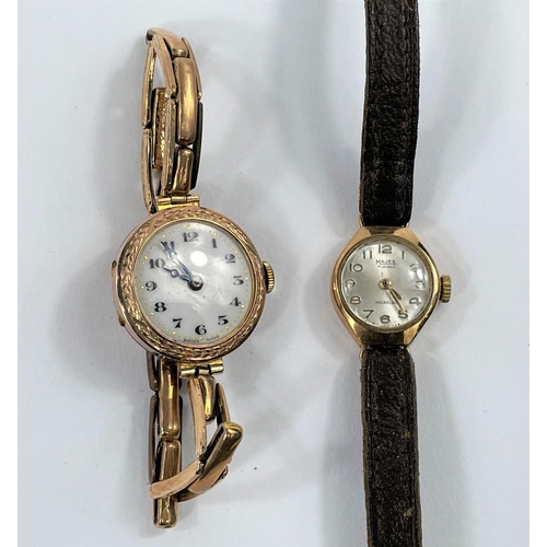 696 - A ladies' 9 carat hallmarked gold wristwatch by Omega, on brown leather strap; an early 20th century... 