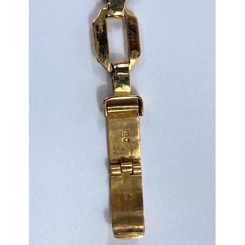 697 - A ladies 9 carat hallmarked gold wristwatch by Omega on yellow metal bracelet, stamped '18c', net we... 