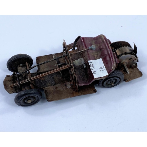 70 - An '0' gauge 'Esso' petrol tank wagon by Hornby, in original box; a 1950's red clockwork motor car b... 