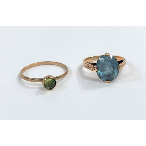706 - A yellow metal dress ring set large pale blue stone, stamped '18c', 3.3 gm; a 9 carat hallmarked gol... 