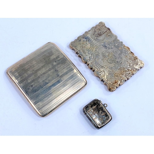 710 - A hallmarked silver card case of shaped rectangular form with extensive chased decoration, Birmingha... 
