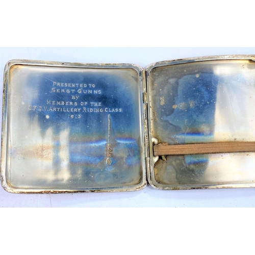710 - A hallmarked silver card case of shaped rectangular form with extensive chased decoration, Birmingha... 