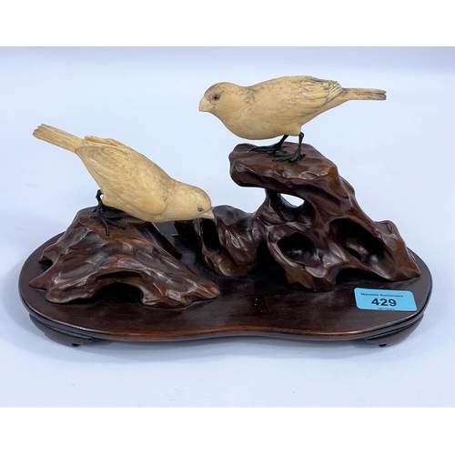 429 - A Japanese Meiji period group of finches on wooden
branch, stand and base