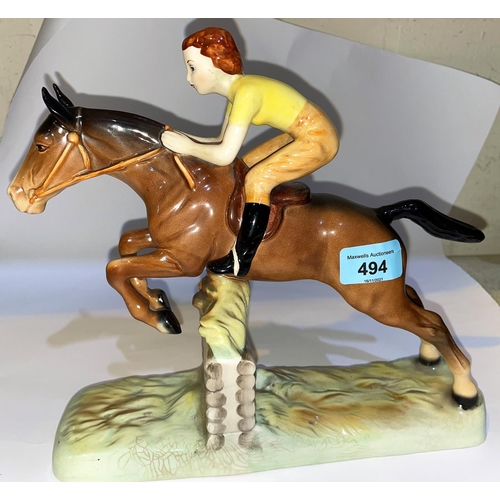 494 - A Beswick group of girl on jumping horse 939, length 26cm (tail restored)