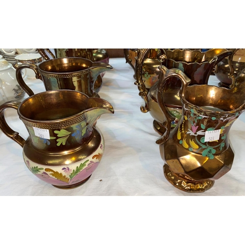 503 - A collection of 10 Victorian copper lustre jugs