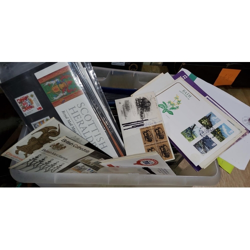 140 - GB:  a collection of mint stamps in packets, FDCs etc