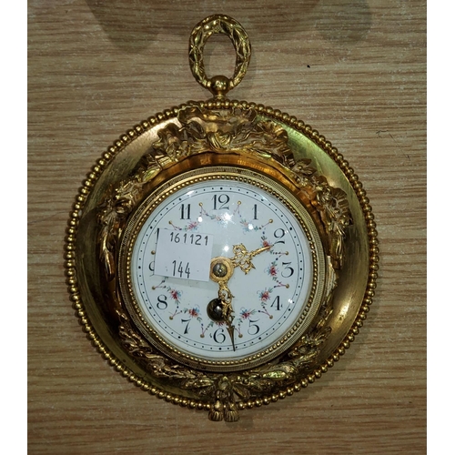 144 - A Louis XVI style ormolu cartel / wall clock with relief decoration and floral porcelain dial and Fr... 