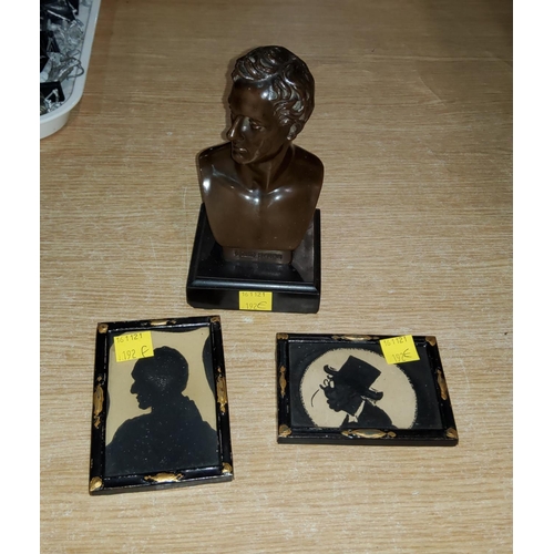 192E - A Bronze bust of Byron on marble plinth signed, 15cm; and two miniature silhouettes framed