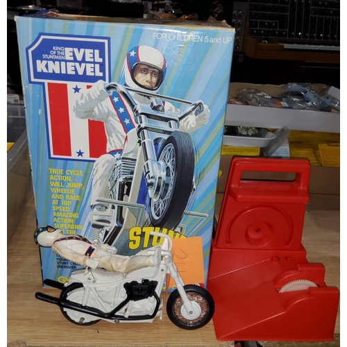 211 - A vintage originally boxed Ideal Evil Knievel Stunt Cycle, with gyro powered motor