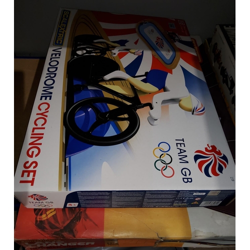 219 - An originally boxed Matchbox Lanechanger racing track, a Team GB Scalextric Velodrome Cycling set or... 