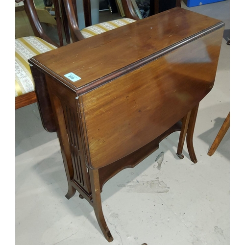 810 - An Edwardian mahogany Sutherland table; a 6 pane wall mirror