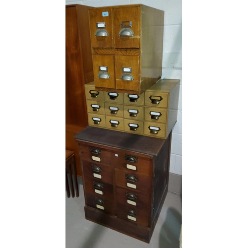 817 - An oak 4 drawer card filing cabinet; a similar 12 drawer cabinet