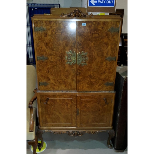 825 - A George I style burr walnut drinks cabinet with 2 double cupboards and cabriole legs