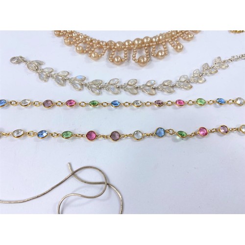 605A - A selection of necklaces, pendants etc
