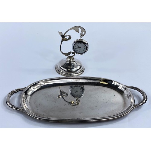 652a - A continental white metal oval tray with 2 handles, bearing foreign marks, 5.5 oz; a weighted fob/po... 