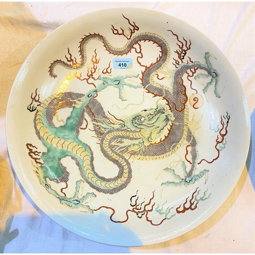 410 - A very large Chinese famille verte charger with large central highly detailed 4 clawed dragon, diame... 