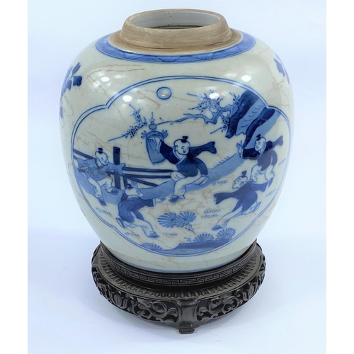432 - A Chinese blue and white ceramic ginger jar, decorated with
panels to either side, one of children p... 