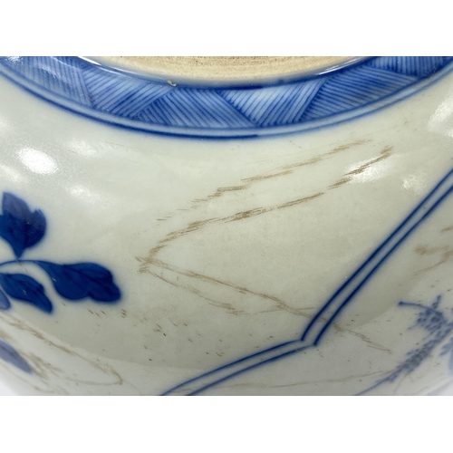 432 - A Chinese blue and white ceramic ginger jar, decorated with
panels to either side, one of children p... 