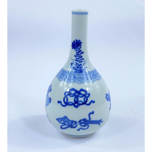 444 - A Chinese blue and white bottle vase decorated with vases
etc, height 17cm